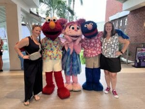 Heather & Sydney at Beaches Negril with Sesame Street Characters